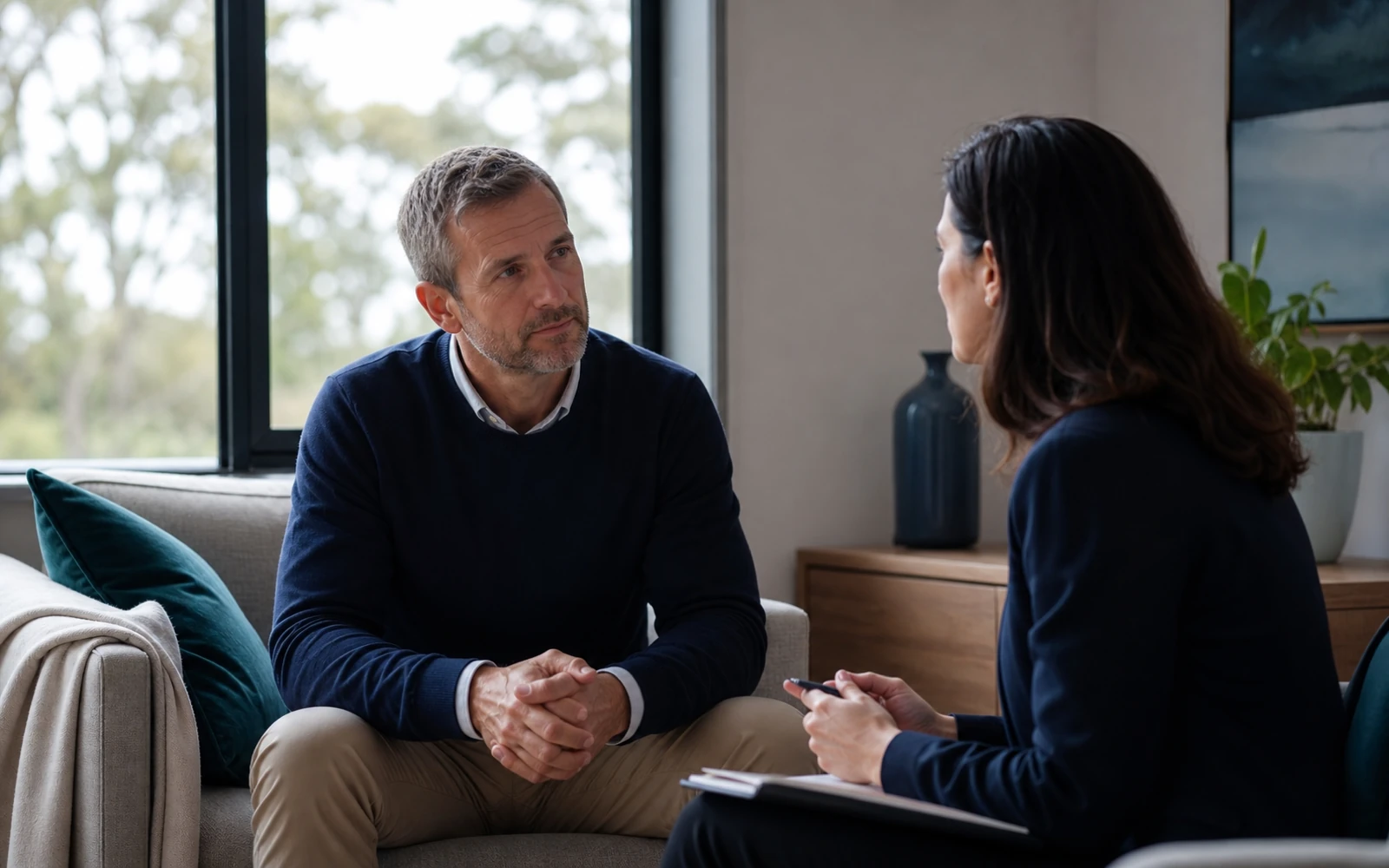Client discussing relationship concerns with a discreet advisor